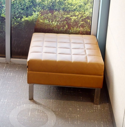 Square gold ottoman