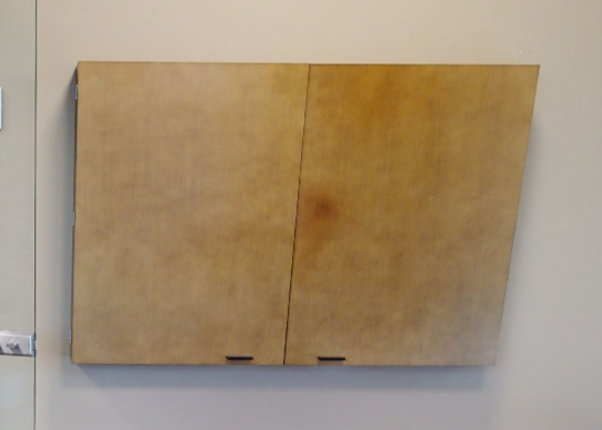 Whiteboard in wall cabinet