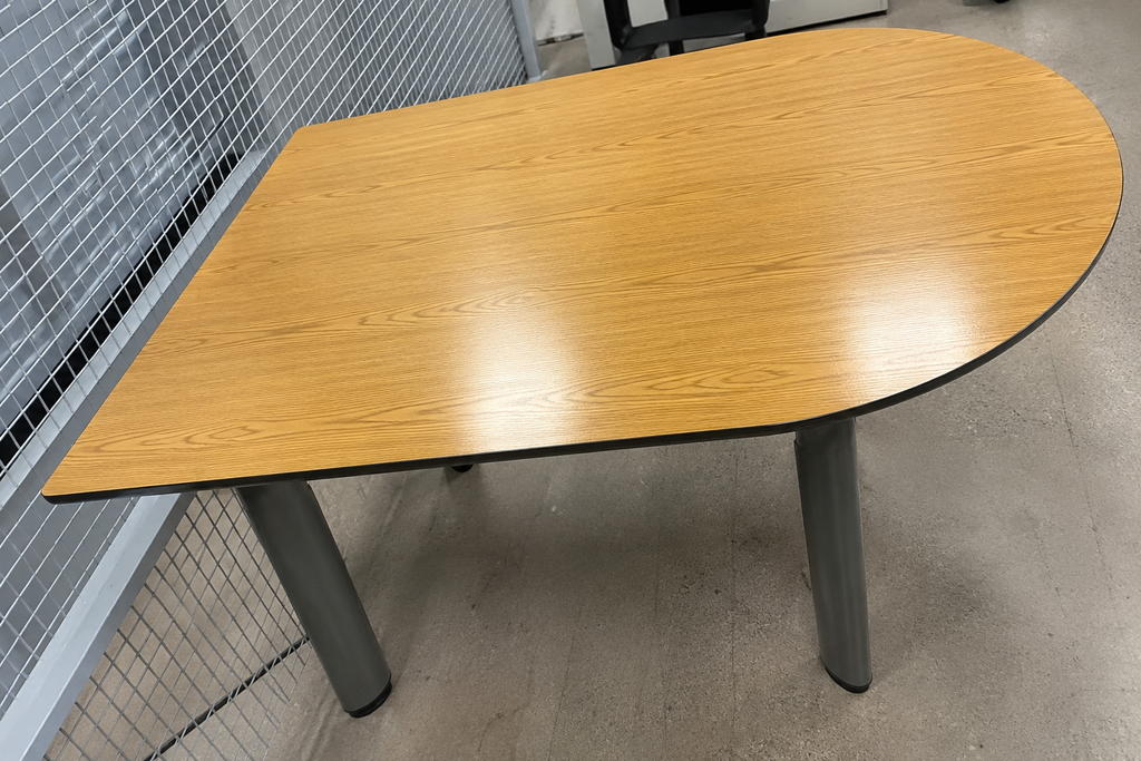 Rectangular desk with rounded side