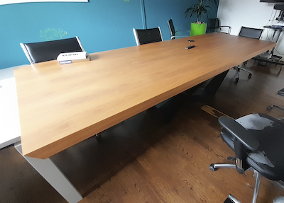 Large wooden board room table