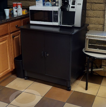 small black rolling cabinetry