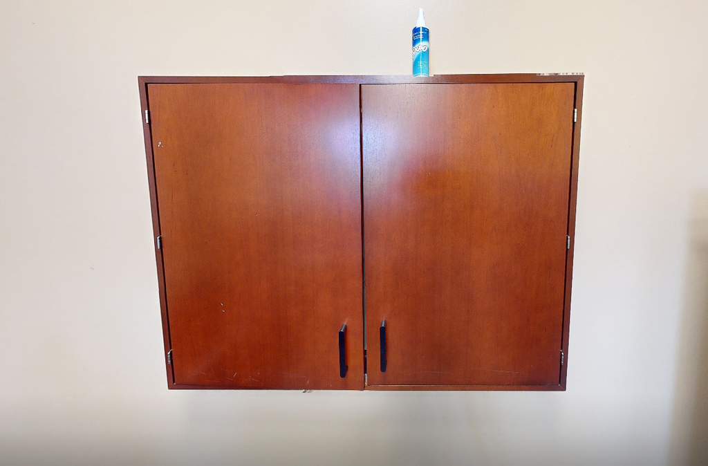 Whiteboard in mounted cabinet