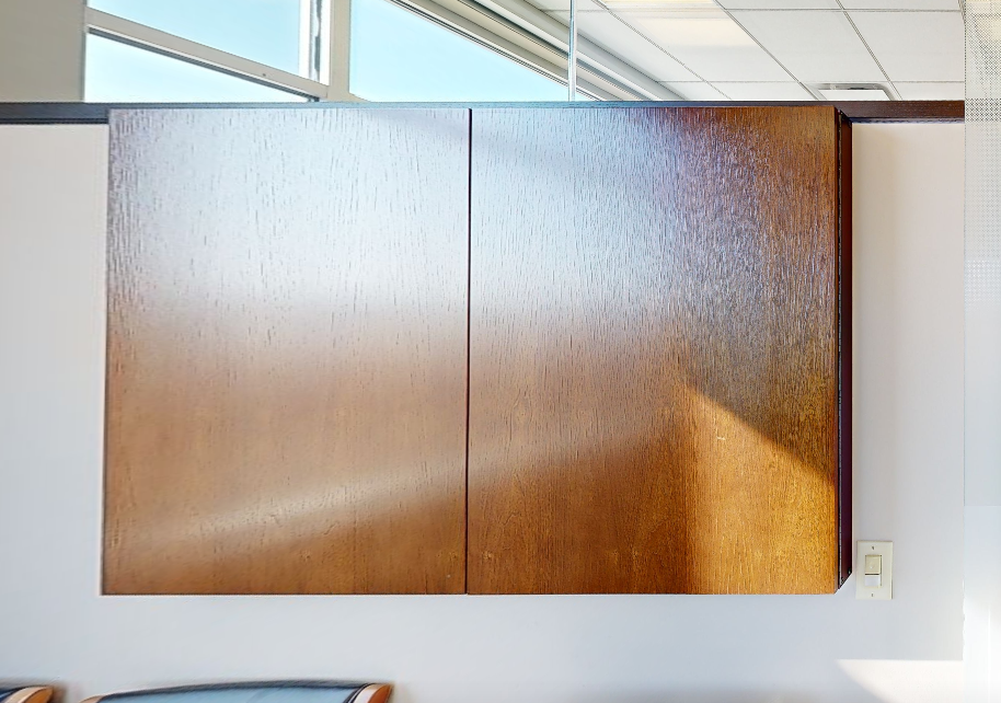 Whiteboard in mounted cabinet