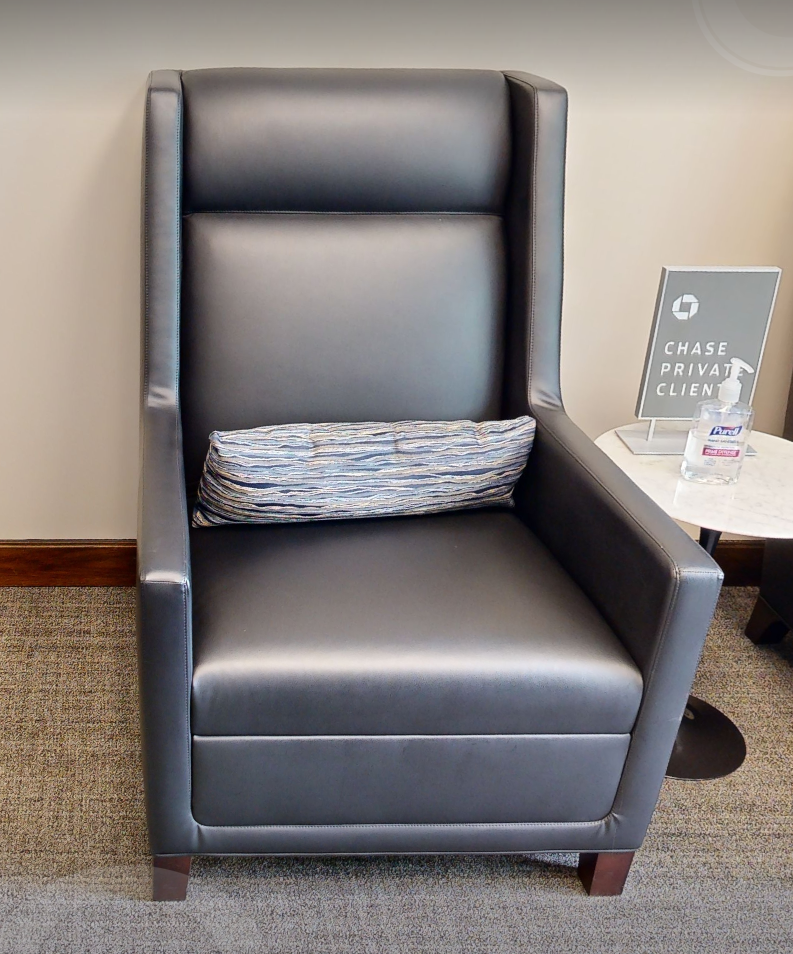 Tall-back black lounge chair