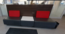 [#C11-6] Side Table (between red/grey chairs)