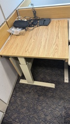[#E10-38] Large office desk with yellow wooden top and metal legs, adjustable