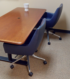 [#B8-7] Blue chair with arms on rollers