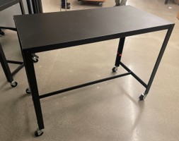 [#C13-58] Black metal table on casters